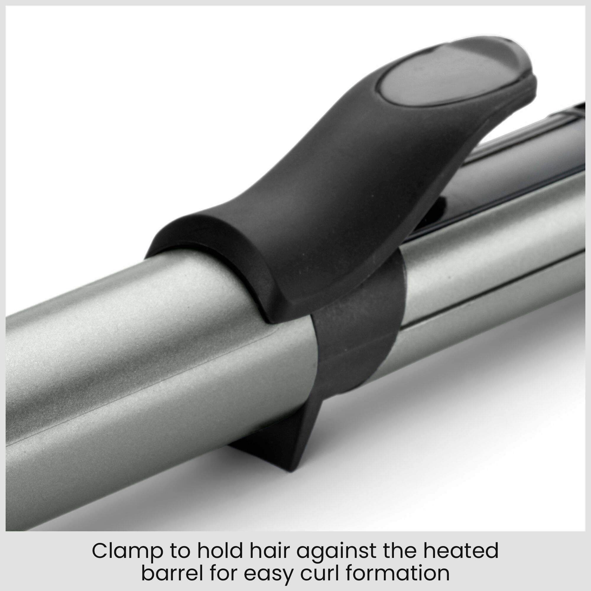 Clamp to hold hair against the heated barrel for easy curl formation